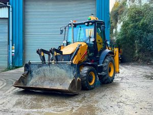 right side view of JCB 3CX with front loader down